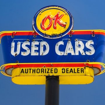 used car sign at a dealership